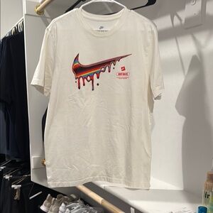 Nike Off White Short Sleeve Tee with Artistic Swoosh